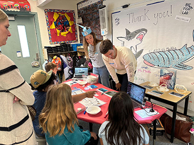 Big Fish Lab giving a shark presentation to elementary students